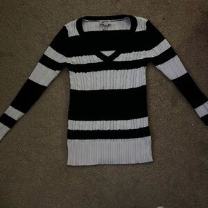 Black and white sweater size small.